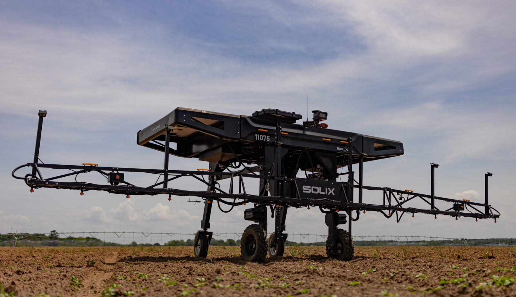 The Solinftec Solix, an autonomous robot used for target spraying in large-scale food production, is at work in the field at UGA Grand Farm