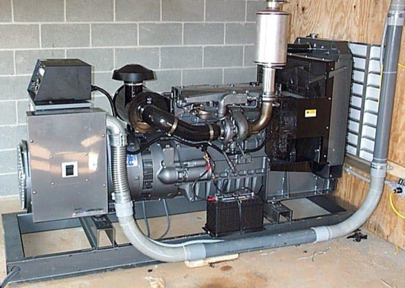 An emergency generator providing backup power to a broiler house during a power outage.