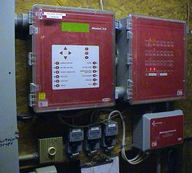 An electronic house environmental controller used to monitor and adjust heating, ventilation, and cooling equipment.