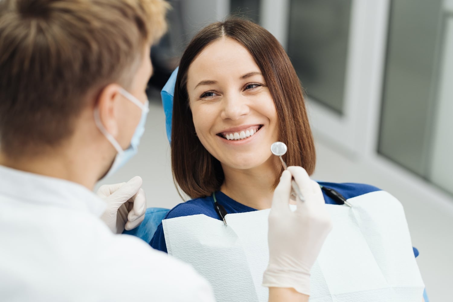 Patient in a dentist's chair.