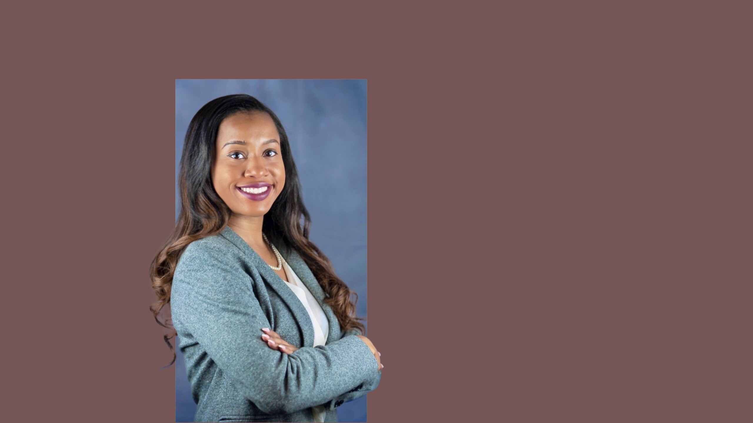 Madelyn Jackson smiles in her professional headshot