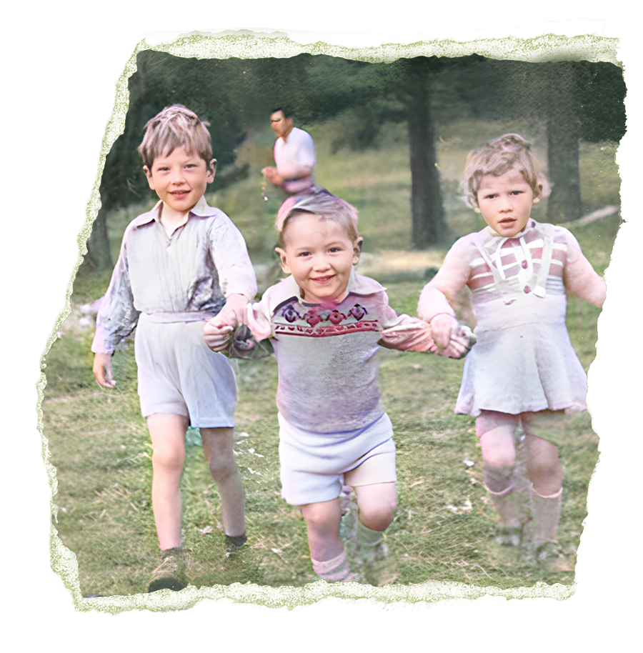 The young Broder siblings link arms while playing