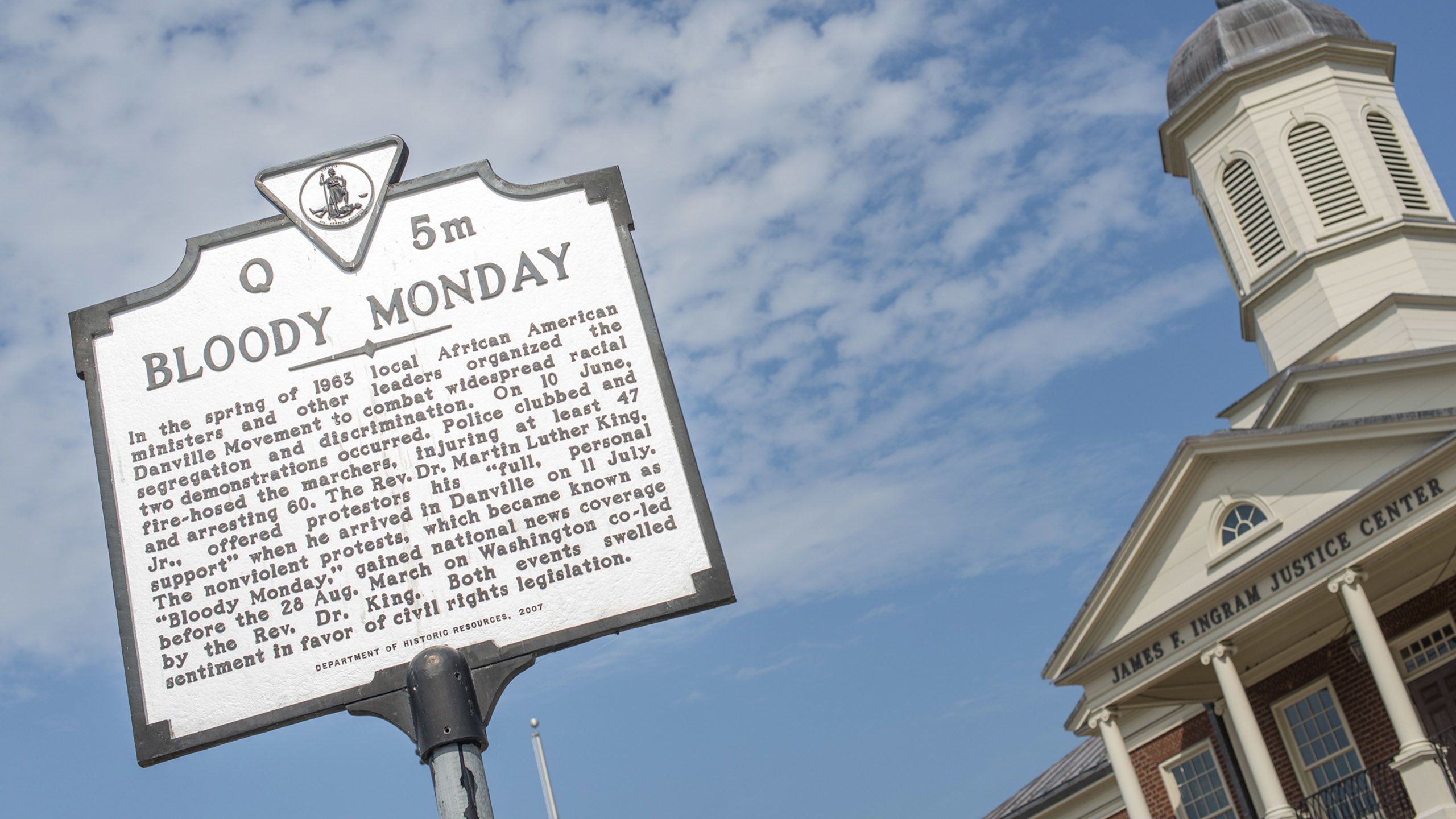 A historical marker sign
