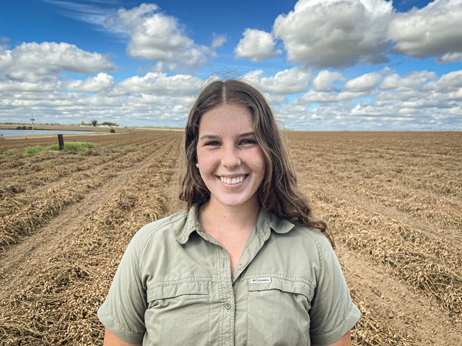 Macie Wheeler standing in a field