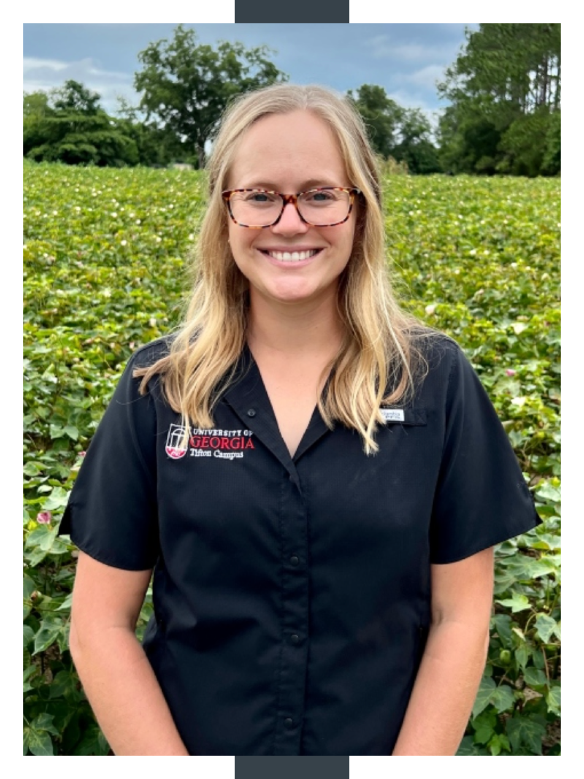 Taylor Randell Singleton wears a UGA Tifton campus shirt while in a local field
