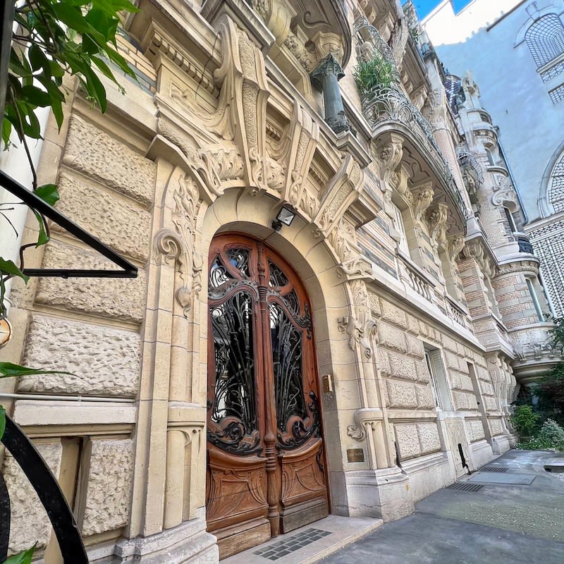 Intricate facade with arched door and doorway