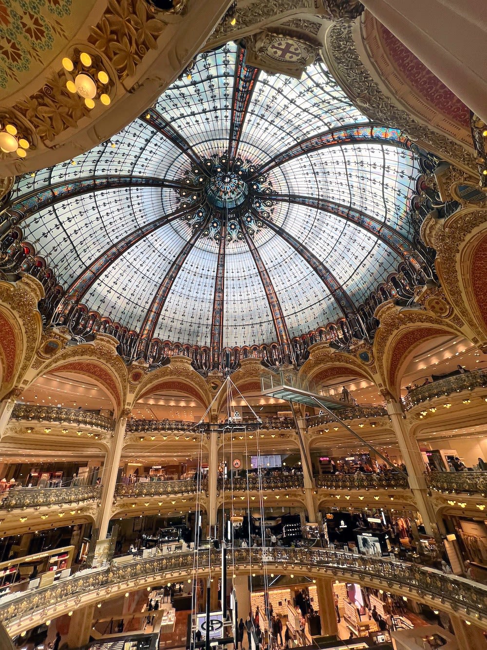 Looking up at the glass ceiling at Galeries Lafayette