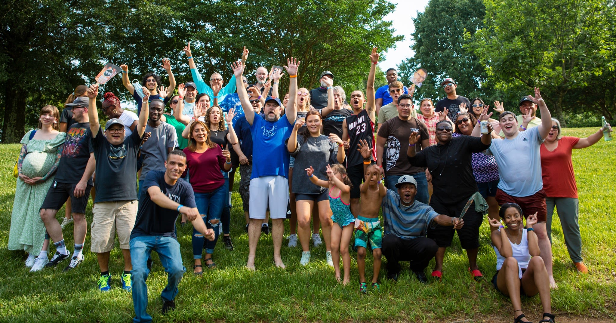Celebratory staff outside on a summer day.