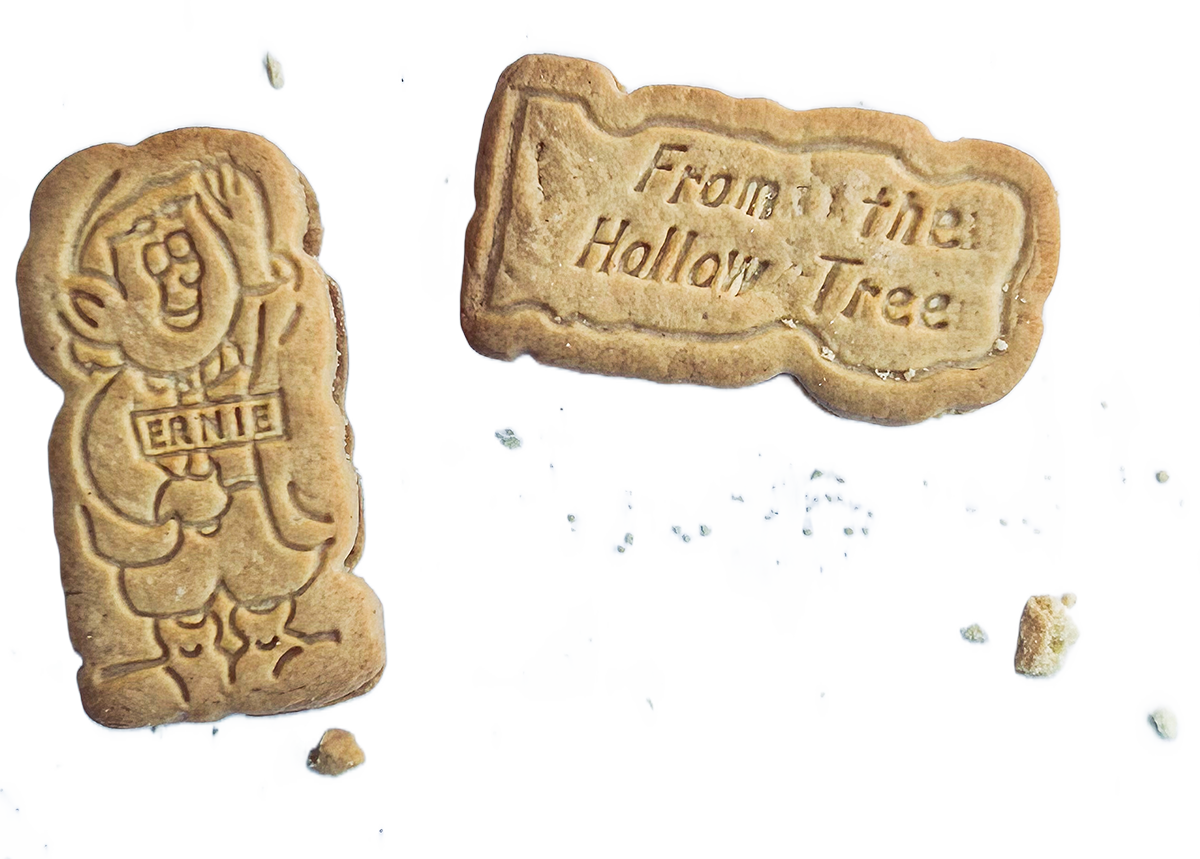 Crumbs and cookies stamped with Ernie the Elf and "From the Hollow Tree"