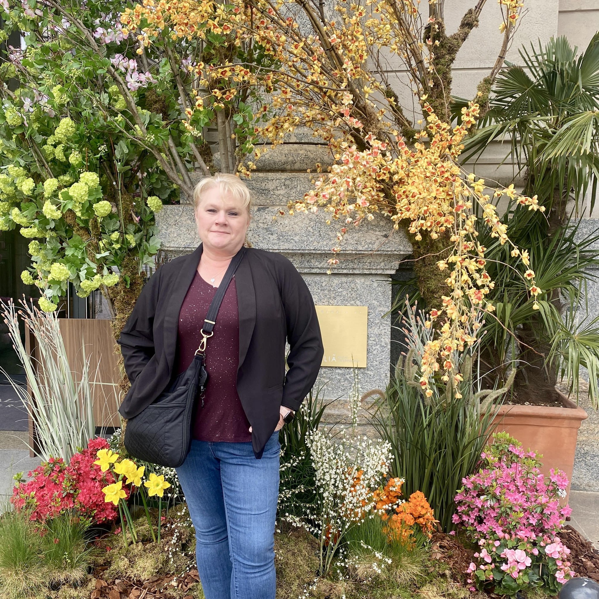 Dupree stands in front of a statue in Milan