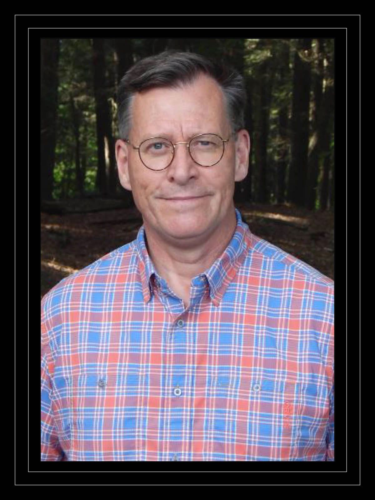 Portrait of man wearing glasses