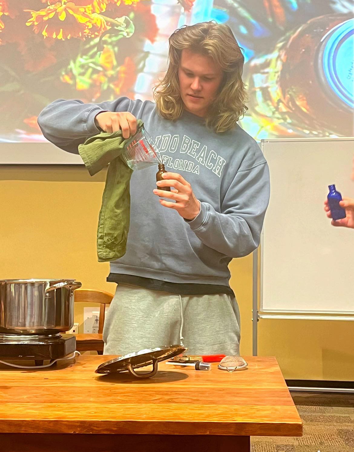 HORT 3440 student makes rosemary olive oil