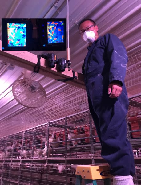 Chai standing with monitor