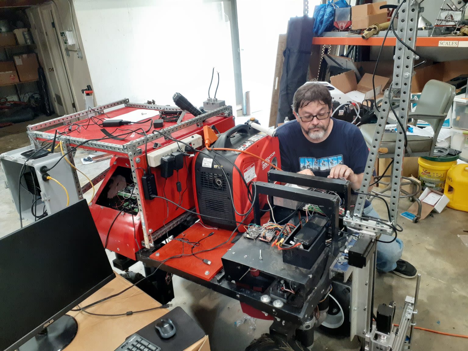 Glen Rains working on cotton harvesting robot