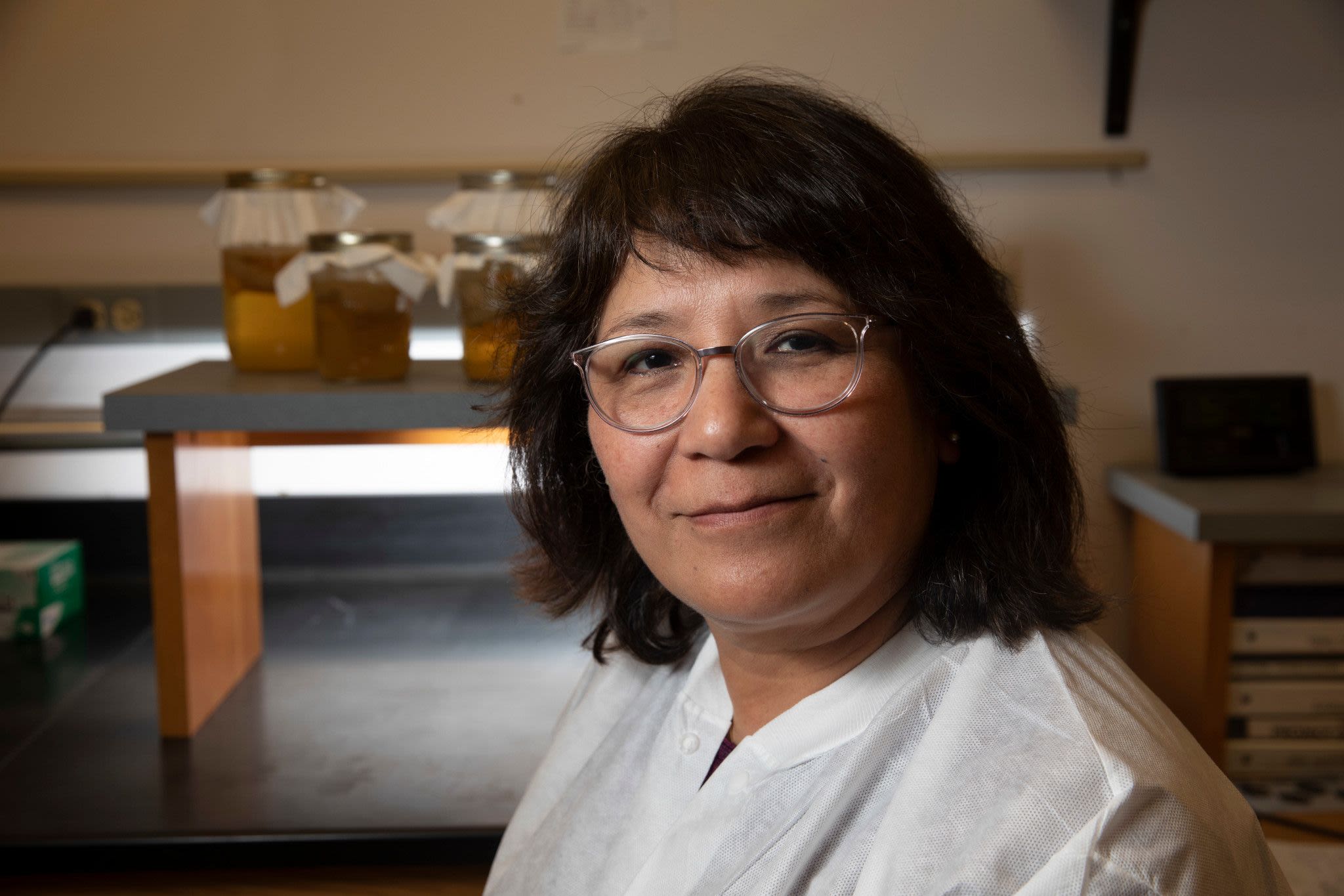 Ynes Ortega smiles in her lab at UGA's Center for Food Safety.