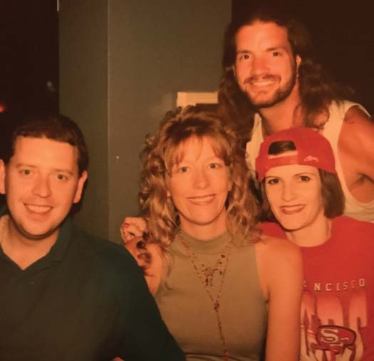 A young Berry (center) is surrounded by fellow comedians at a comedy club in Los Angeles