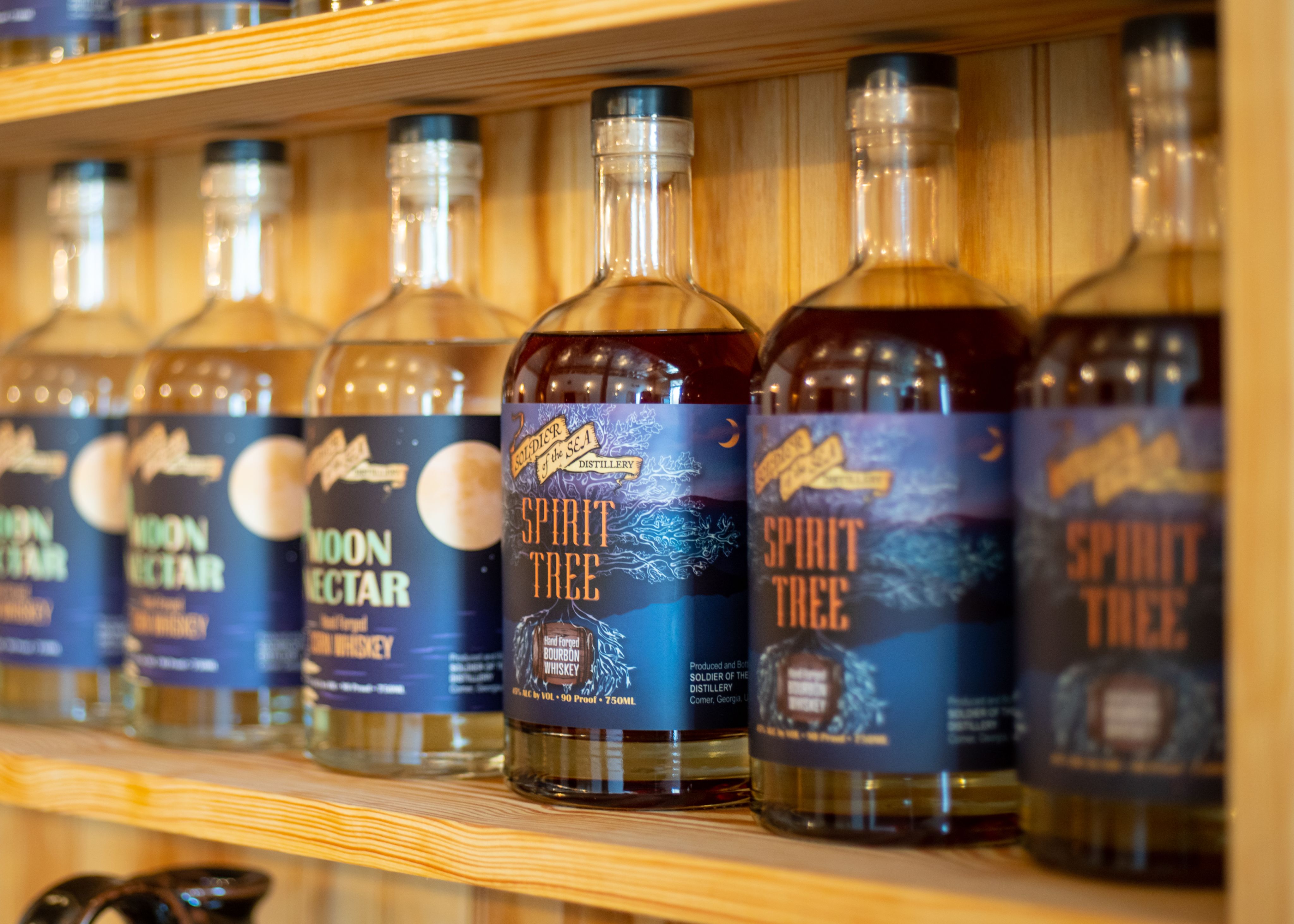 Whiskey offerings at Soldier of the Sea, lined up on a shelf