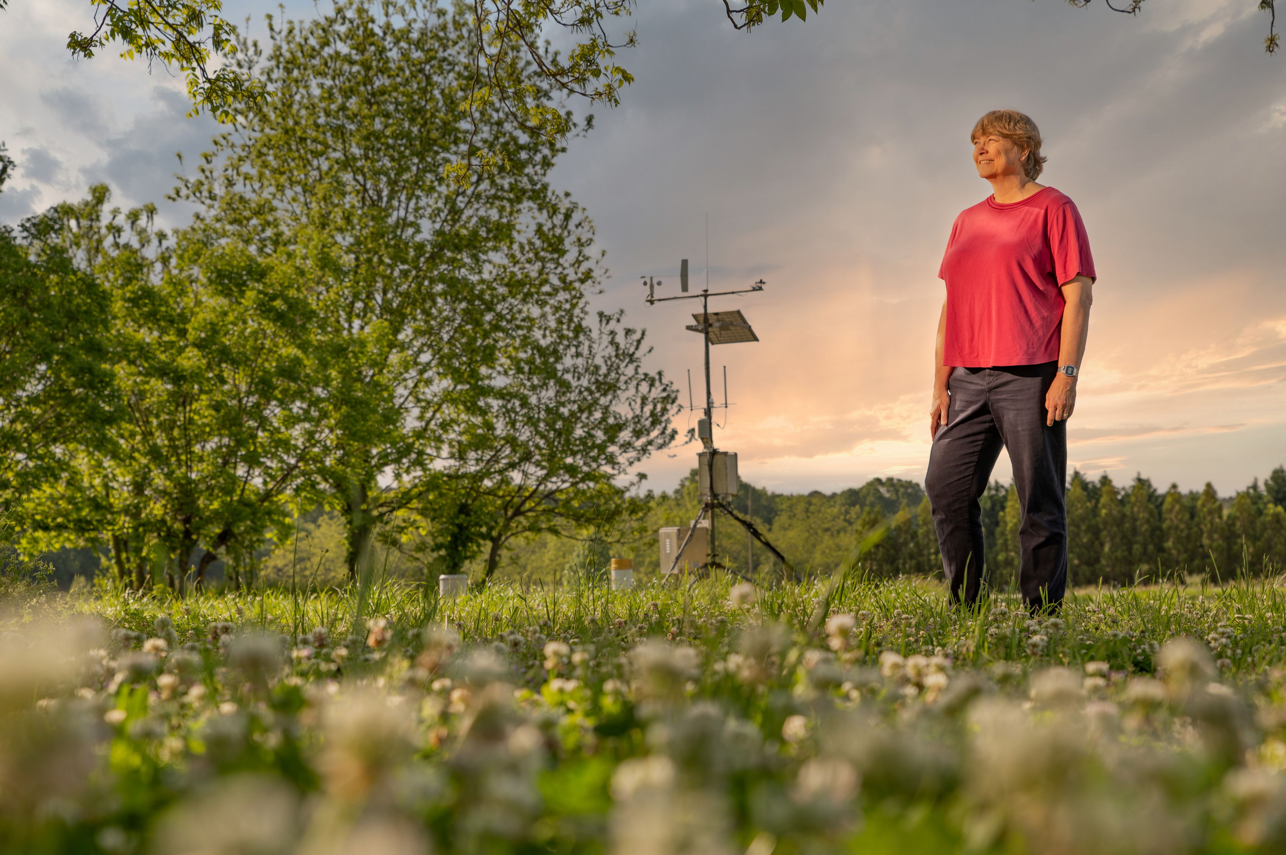 Agricultural climatologist Pam Knox monitors the effects of climate change on agriculture throughout the U.S. Here, she checks a weather monitoring system at Durham Horticulture Farm in Watkinsville, Ga. on April 8, 2022.