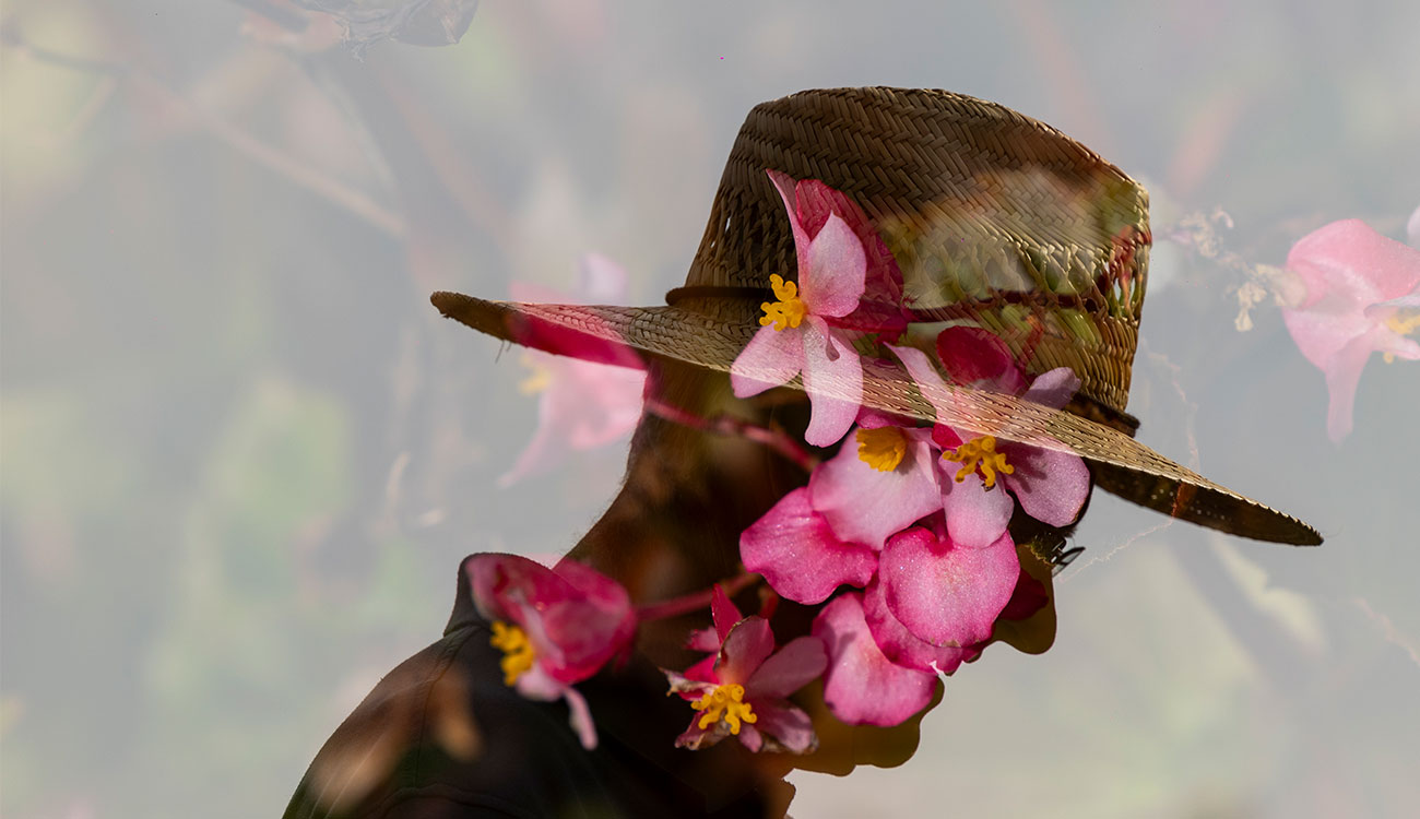 John Ruter and flowers in a dual-exposure portrait.