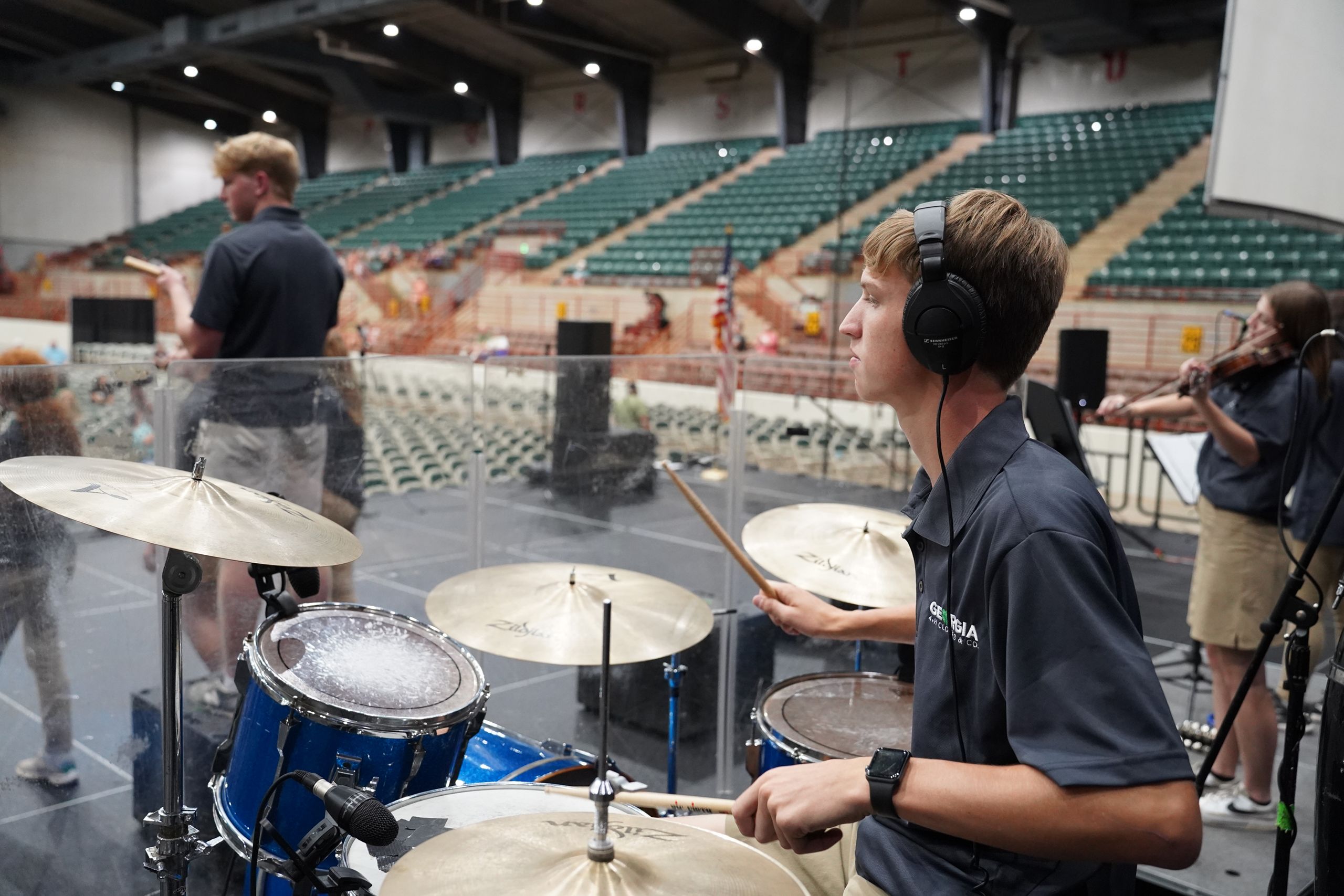 A drummer performs with Clovers and Co. at the Georgia National Fair. 