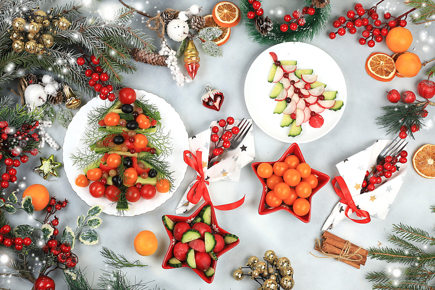 a holiday table is set with trays of vegetables for healthy snacking