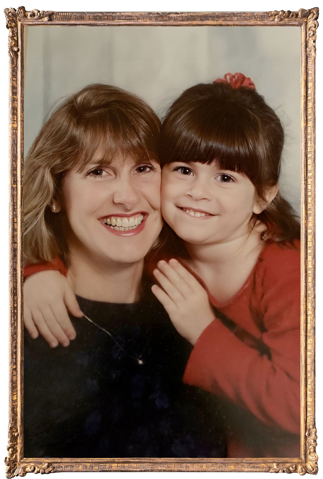 Photo of Janvier as a young child, cheek to cheek with her mother.
