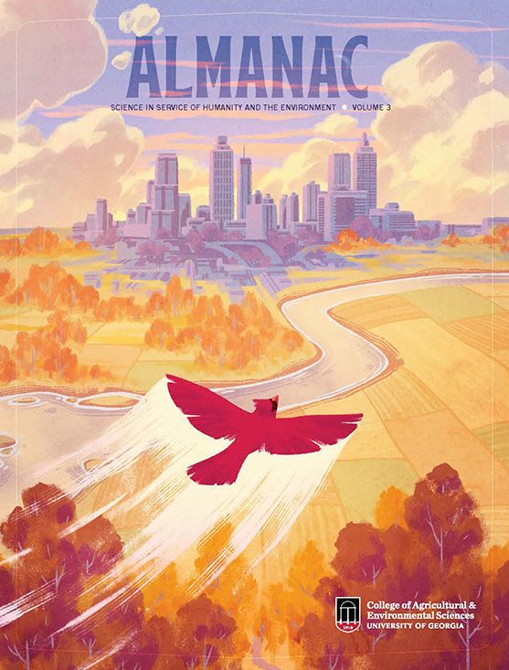 Illustrated cover of "Almanac: Science in Service of Humanity and the Environment," Volume 3, featuring a red cardinal flying over an autumn forest toward Atlanta’s skyline, symbolizing the connection between nature and urban life.