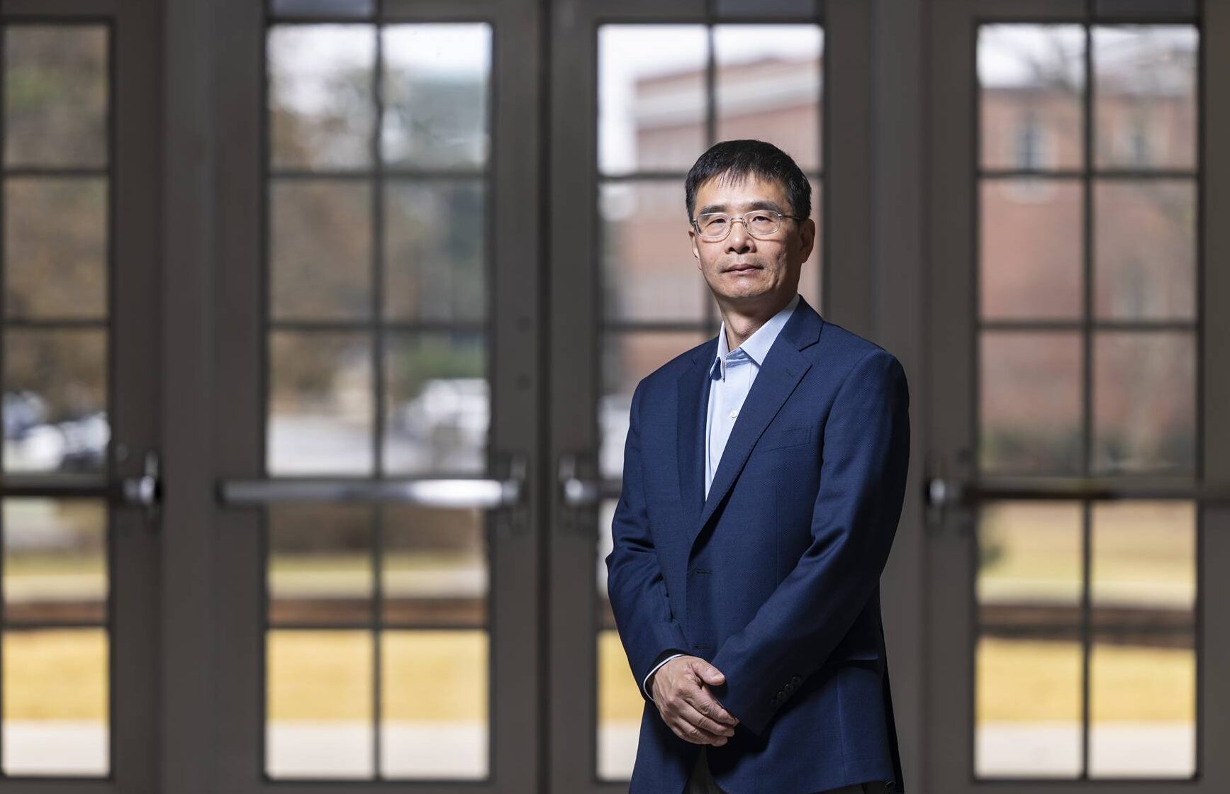 Portrait of College of Agricultural and Environmental Sciences faculty member Qingguo (Jack) Huang in the Student Learning Center on the UGA Griffin Campus.
