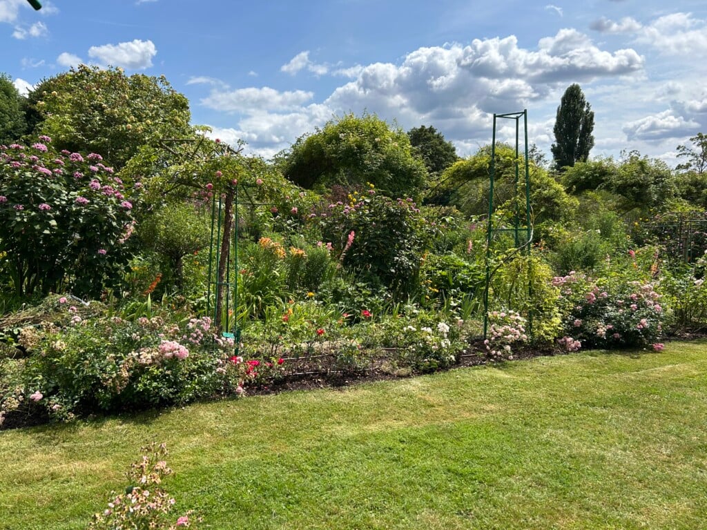 A medium angle photo of the lush green gardens.