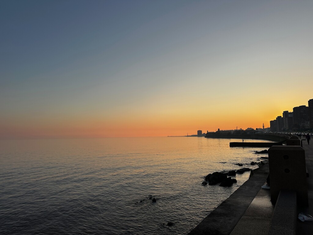 An image of a beach on the coast of Uruguay at sunset.