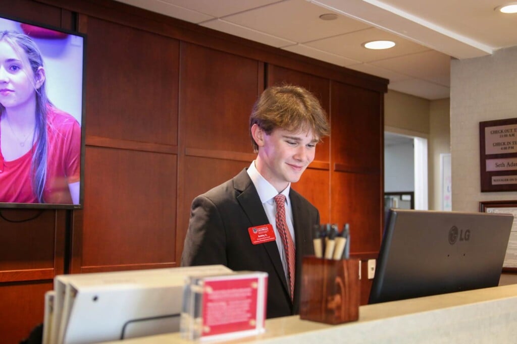 Bobby Gillespie works behind the counter at the Georgia Center hotel