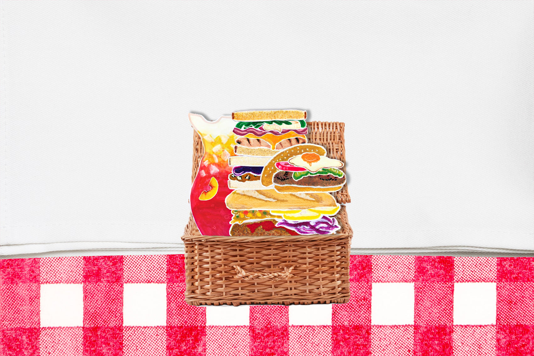 Open picnic basket filled with food on tablecloth background